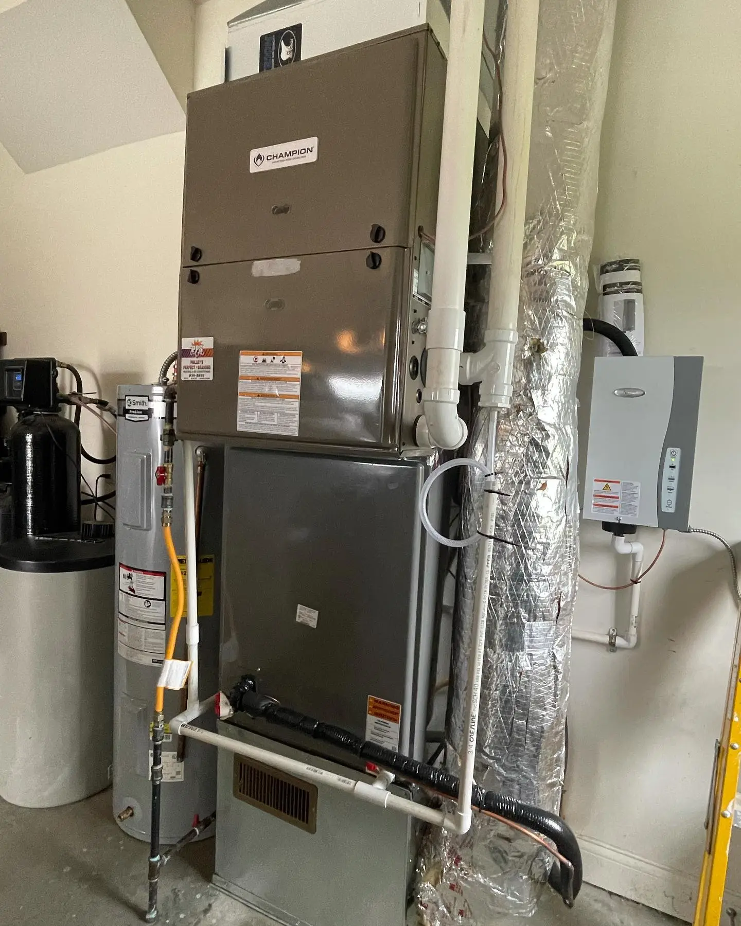 Champion furnace garage install inspected during a Clayton maintenance visit