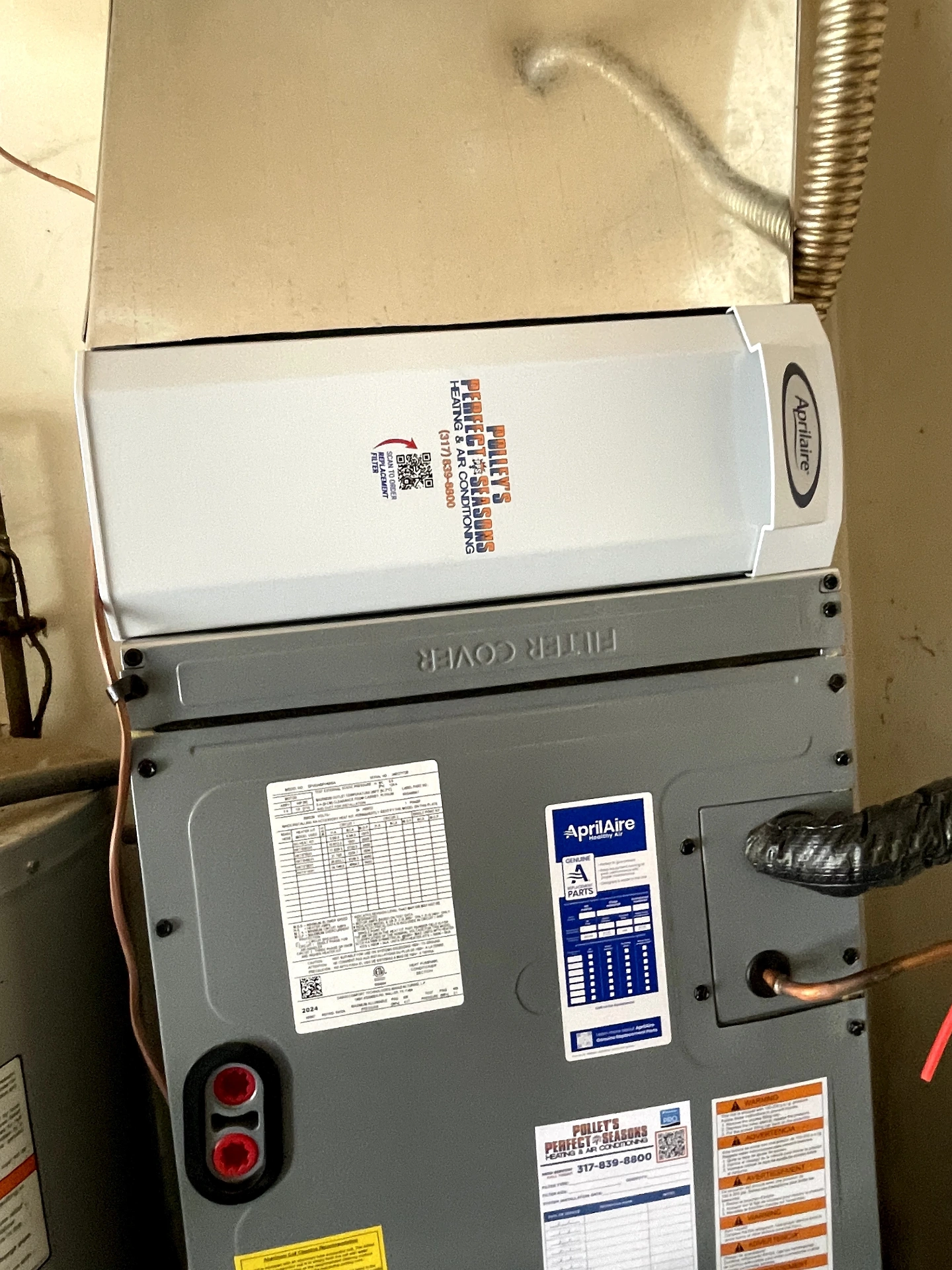 AprilAire whole-home media air purifier installed on a Daikin air handler in Plainfield, IN