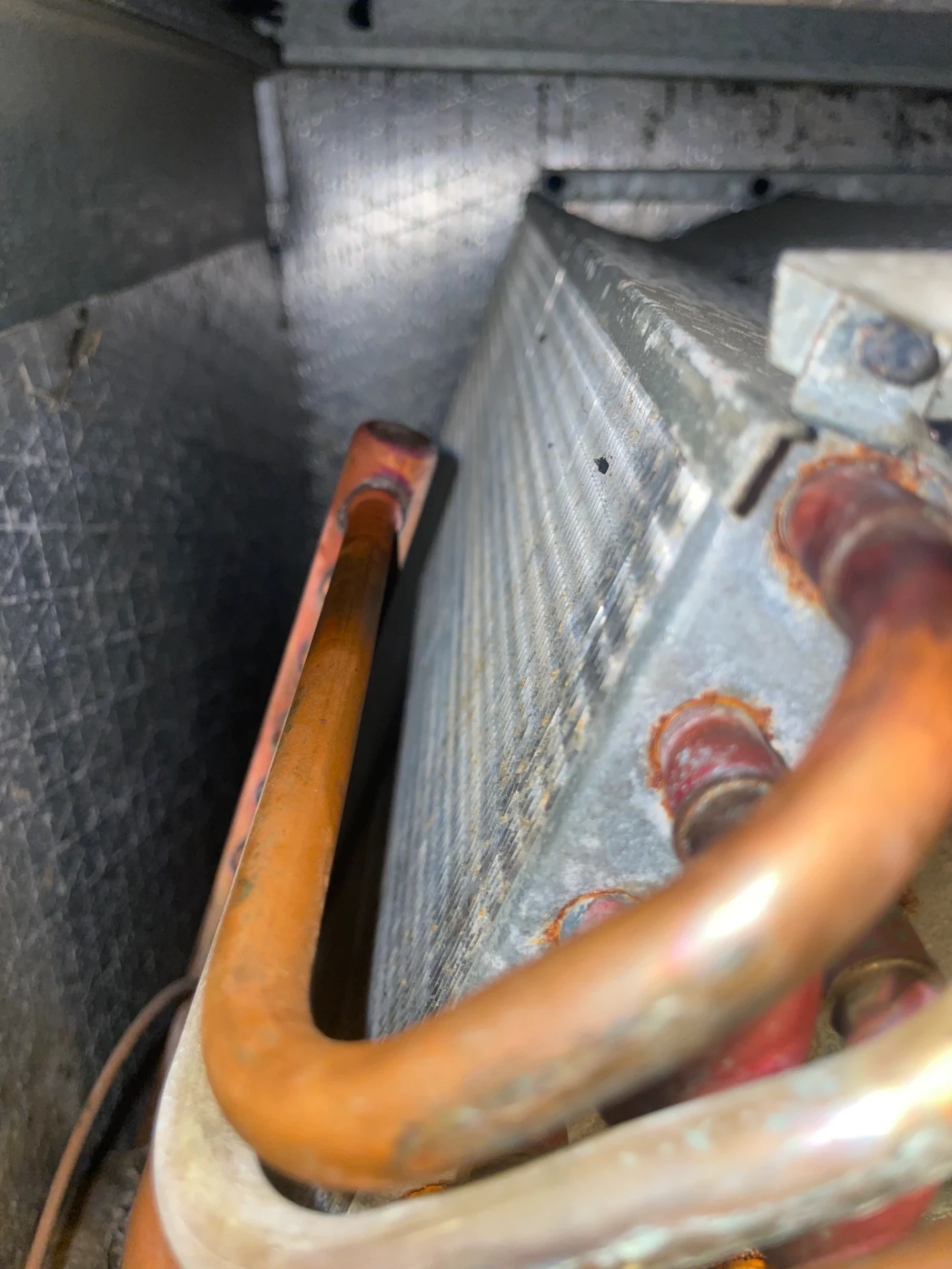 Corroded AC coil copper lines in a western Hendricks County home